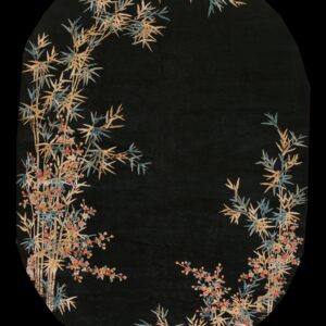 Black oval rug featuring a bamboo and floral border in tan, blue, and pink against a dark field.