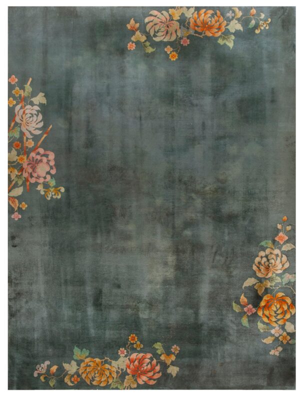 Distressed dark teal rug with corner bouquets of orange, coral, and pink flowers.