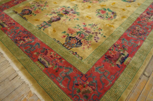 High-pile rug featuring a gold field with colorful floral vases and a complex red, teal, and green border.