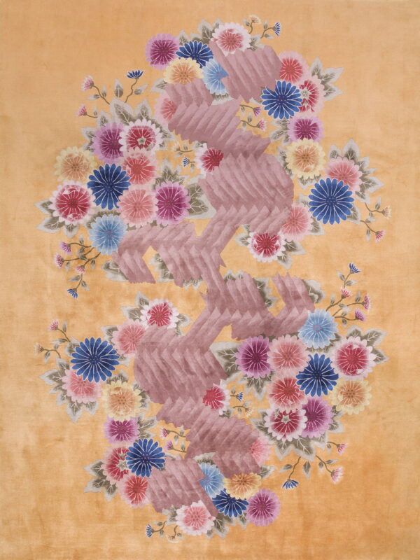 Low-pile golden rug with vibrant floral motifs and a raised, zigzagging textured mauve central panel.