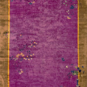 Deep purple high pile rug bordered in brown, accented by scattered blue and yellow floral motifs.