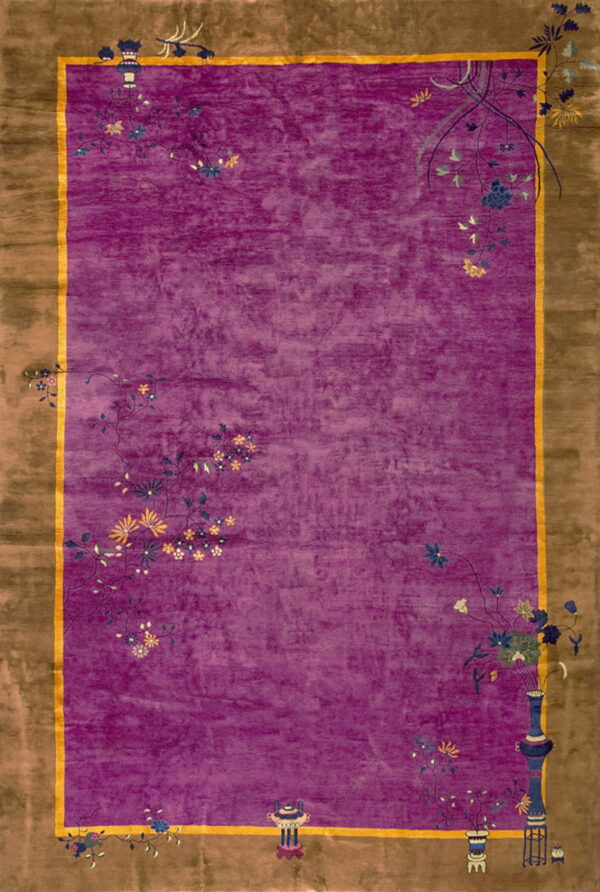 Deep purple high pile rug bordered in brown, accented by scattered blue and yellow floral motifs.
