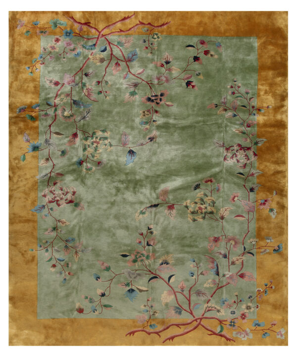 Sage green rug with a wide gold border features climbing pink and blue stylized floral vines.