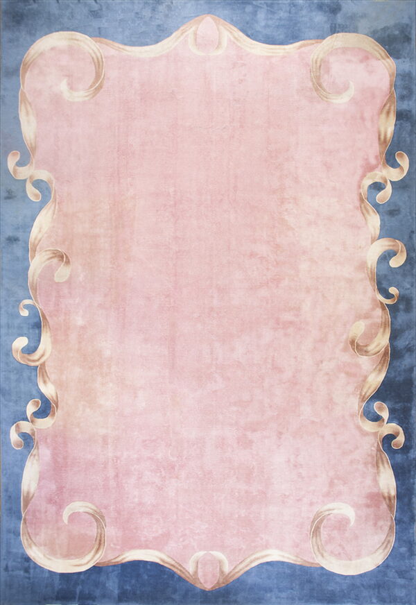 Light pink rug with a ribbon-like beige border framing the center against a textured blue background.