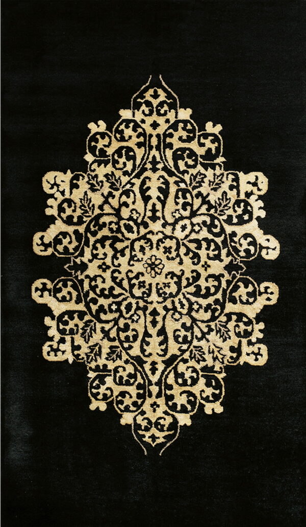 Plush black rug featuring an intricate, symmetrical floral medallion pattern in contrasting gold.