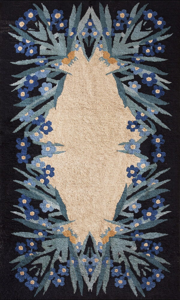 High and low pile rug with a beige center framed by black, blue flowers, and green leaves.