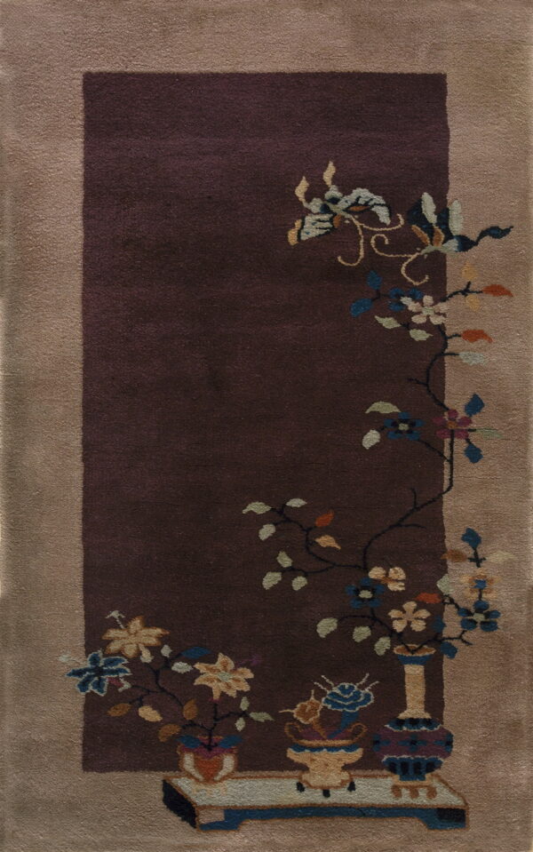 Vertical rug with a deep purple field, tan border, and multicolored vases and floral patterns.