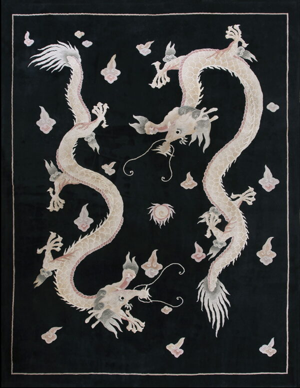 Black rug featuring two intertwined light cream dragons and scattered grey and pink cloud motifs.