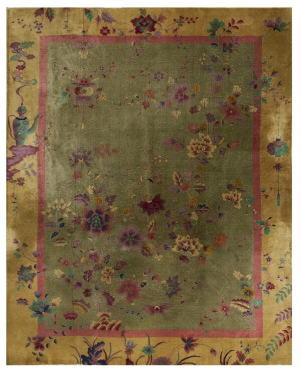 Olive green rug with colorful floral motifs, framed by a rose guard border and golden outer edge.