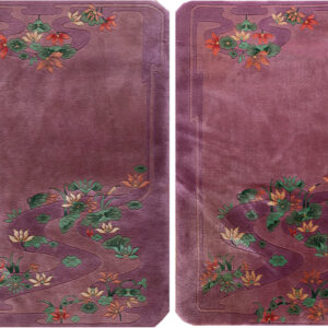 Purple rug with floral design.