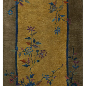 Golden yellow runner rug with an olive border and colorful blue, pink, and purple floral vine details.