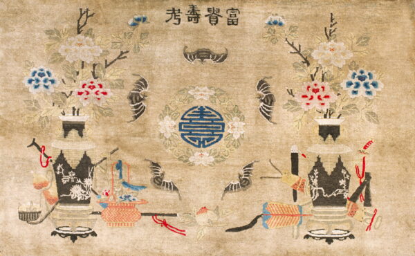 Beige rug with an intricate pattern of vases, red and blue flowers, bats, and chinese characters.