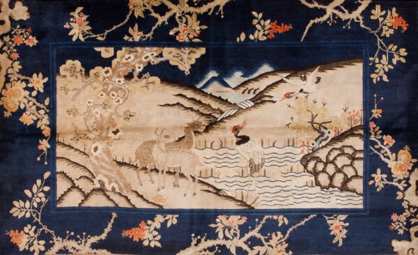 Elegant scene with cranes and deer.