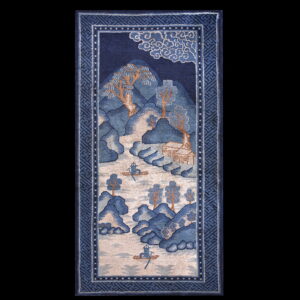 Navy blue rug with a beige landscape scene, featuring trees, hills, boaters, and a geometric border.