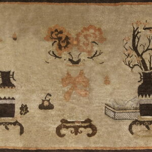Light beige rug featuring a still life pattern of dark brown vases, flowering branches, and stylized objects.