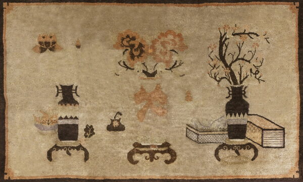 Light beige rug featuring a still life pattern of dark brown vases, flowering branches, and stylized objects.