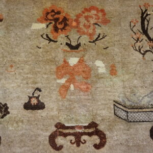 Muted beige rug with detailed dark brown vessels, orange blossoms, and stylized floral patterns.