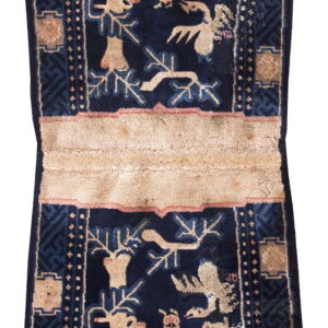 Deep navy rug runner featuring stylized tan wildlife panels, geometric borders, and a prominent horizontal beige band.