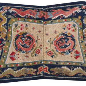 Navy blue and tan rug with symmetrical coral dragon patterns and a richly detailed multicolor border.
