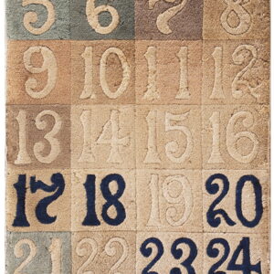 A plush, carved rug displays large numbers in alternating squares of navy, tan, brown, and green.