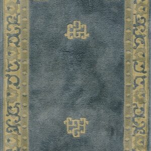 Muted blue runner rug with a wide cream border and low-relief geometric and stylized floral motifs.