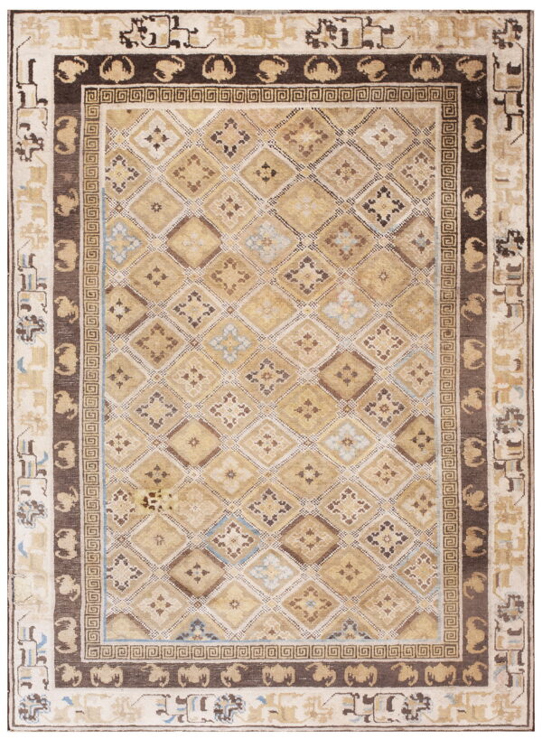 Beige and brown geometric rug with diamond field, light blue accents, and dark, detailed borders.