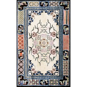 Cream rug with stylized pink florals and a wide black border featuring blue and multi-colored geometric panels.