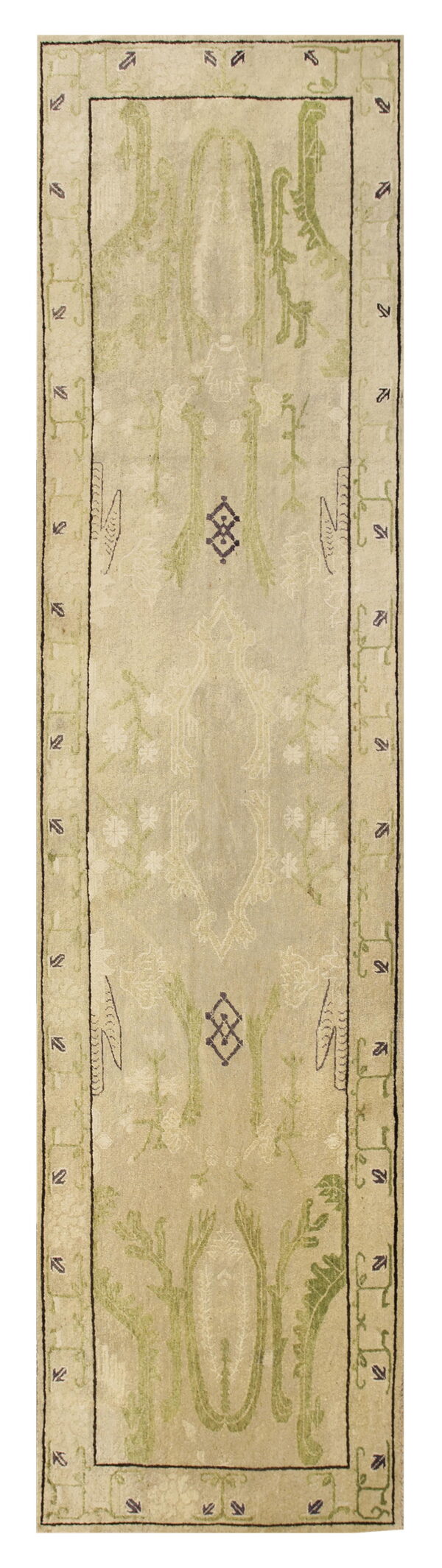 A long beige runner rug features abstract botanical designs in faded green and subtle purple accents.