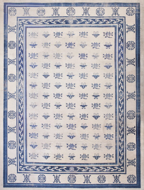 Off-white rug with alternating blue floral and butterfly motifs and shou symbol borders.