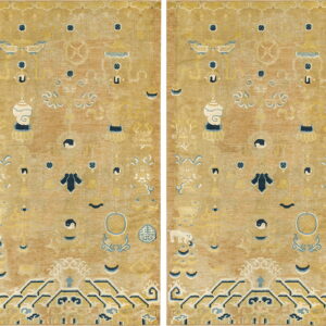 Faded golden rug with scattered blue and white symbols above a stepped, geometric navy and yellow border.