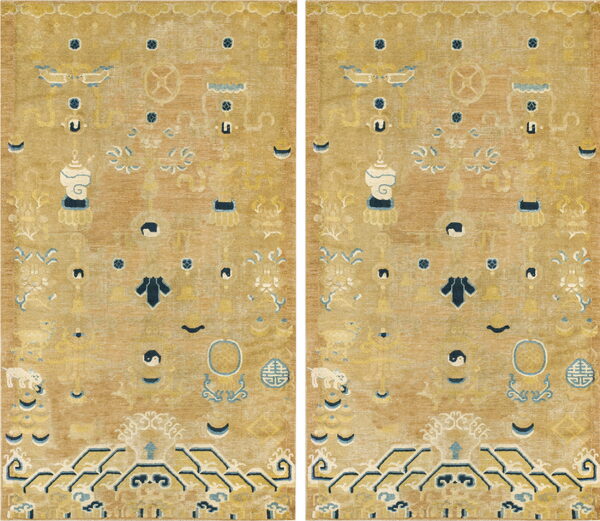Faded golden rug with scattered blue and white symbols above a stepped, geometric navy and yellow border.