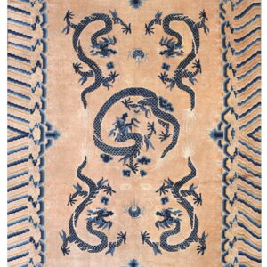 Peach rug with dark blue stylized dragons and cloud motifs, framed by a patterned wave border.