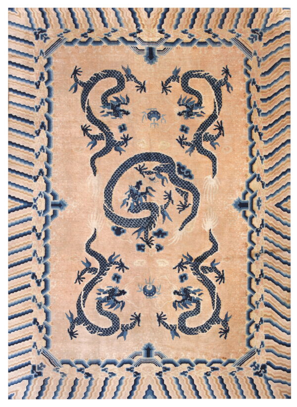 Peach rug with dark blue stylized dragons and cloud motifs, framed by a patterned wave border.