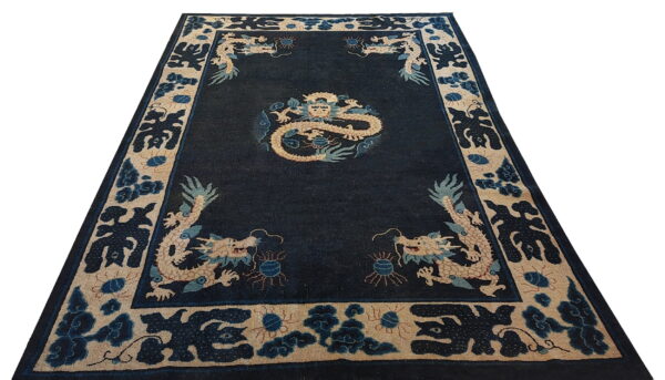 Antique chinese - ningxia hallway runner wool blue rug 1 Dark blue rug with beige and light blue dragon and cloud motifs, displayed against a white background.