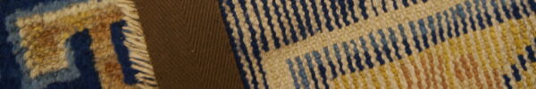 Three adjacent fabric panels show dark brown, blue and yellow shag texture, and striped flatweave.