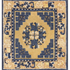 Navy blue and tan high-pile square rug with a traditional central geometric medallion design.
