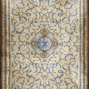 A rectangular beige rug featuring an elaborate blue foliate pattern and a wide brown outer border.