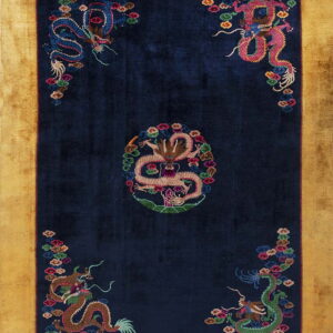 Deep blue rug with gold border, showing a central dragon medallion and four colorful corner dragons.