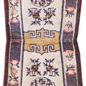 Stylized cream runner with dark borders, large floral medallions, and a central gold fretwork motif.