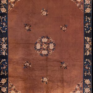 Elegant brown rug with floral patterns.