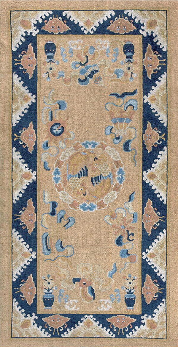 Tan runner rug with a navy blue border, detailed with gold, light blue, and peach oriental motifs.