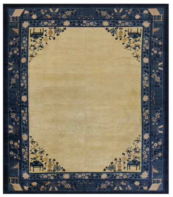 Rectangular rug featuring a pale yellow field surrounded by a wide blue border with floral and architectural motifs.