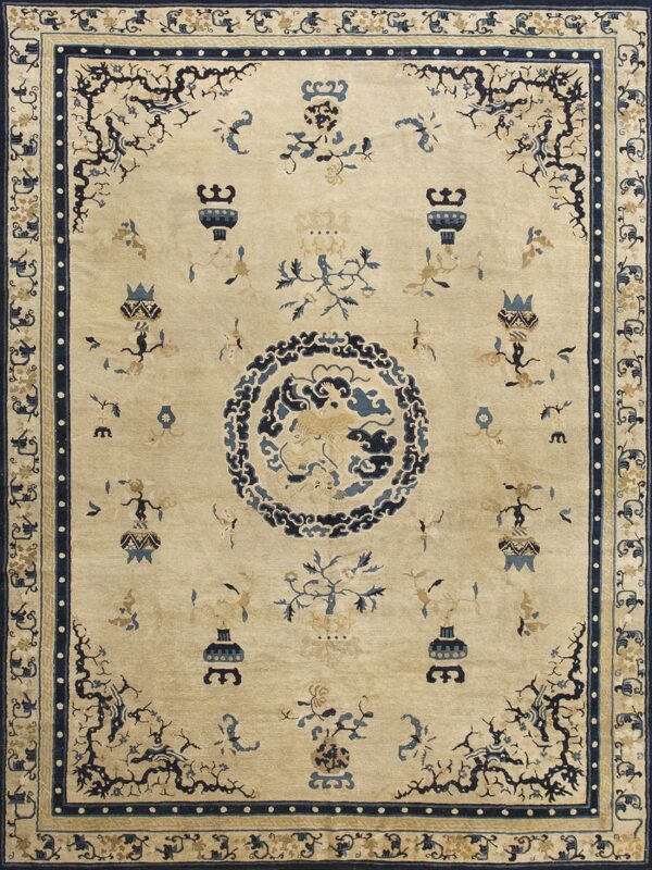 Light beige rug featuring a detailed dark blue medallion, scattered vase motifs, and thick ornate borders.