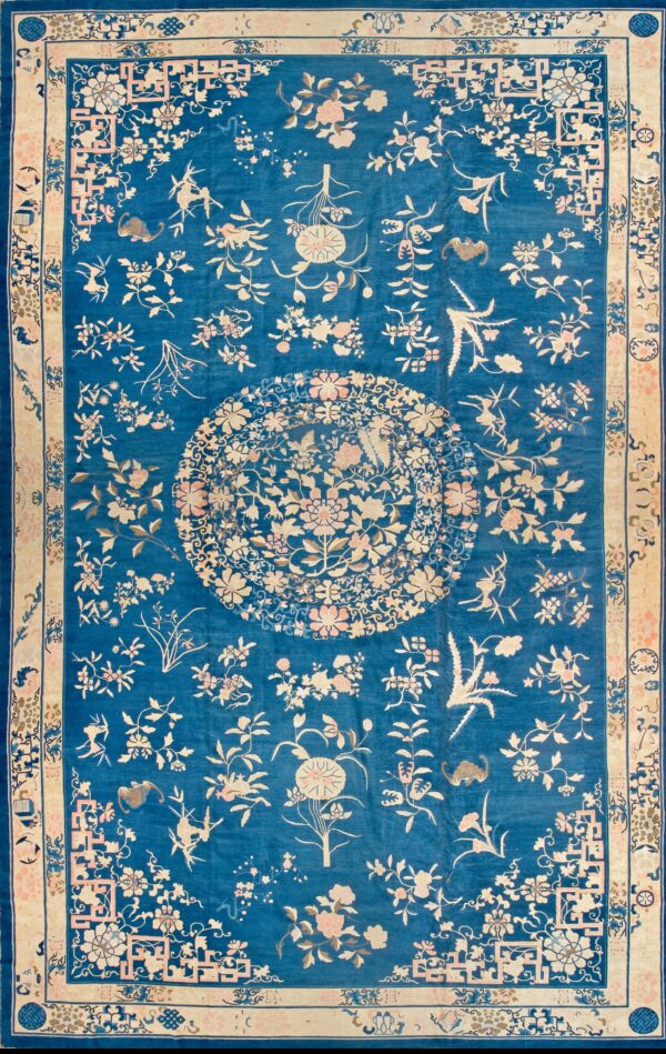 Intricate floral design on blue background.