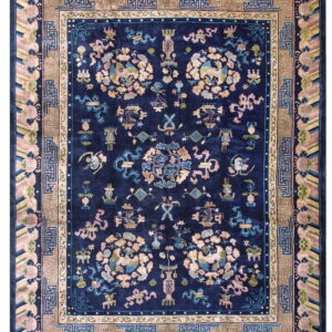 Plush navy blue rug with stylized pale pink and light blue animal motifs and multiple ornate borders.