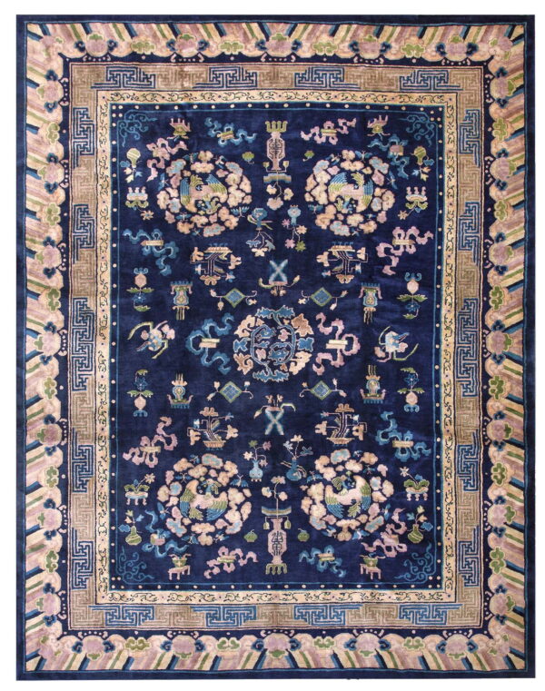 Plush navy blue rug with stylized pale pink and light blue animal motifs and multiple ornate borders.