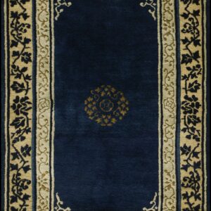 High-pile navy blue runner with detailed beige and gold floral borders and a center medallion.