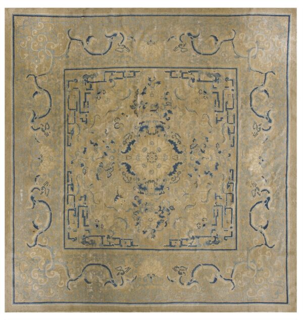 Square gold rug featuring a complex blue central medallion and stylized geometric borders.