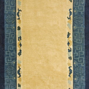 Gold runner rug featuring a wide, high-contrast blue border with geometric and stylized cloud motifs.