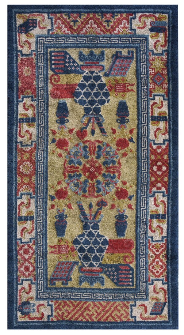 Blue, red, and beige runner rug featuring a detailed, medium-pile geometric design with repeating borders.